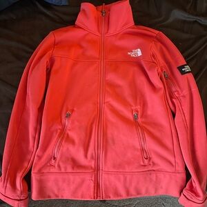 The North Face jacket with zipper pockets..